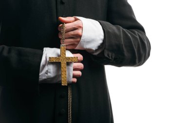 cropped view of catholic priest holding necklace with golden cross isolated on white