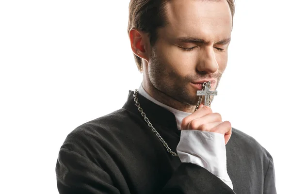 Young Serious Catholic Priest Kissing Holy Cross Closed Eyes Isolated — ストック写真