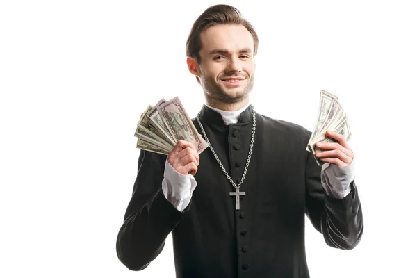 Sacerdote Católico Corrupto Sonriendo Cámara Mientras Sostiene Billetes Dólar Aislados —  Fotos de Stock