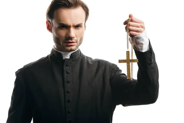 Serious Catholic Priest Holding Golden Cross While Looking Camera Isolated — ストック写真