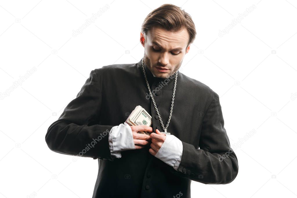 greedy catholic priest hiding money in cassock isolated on white
