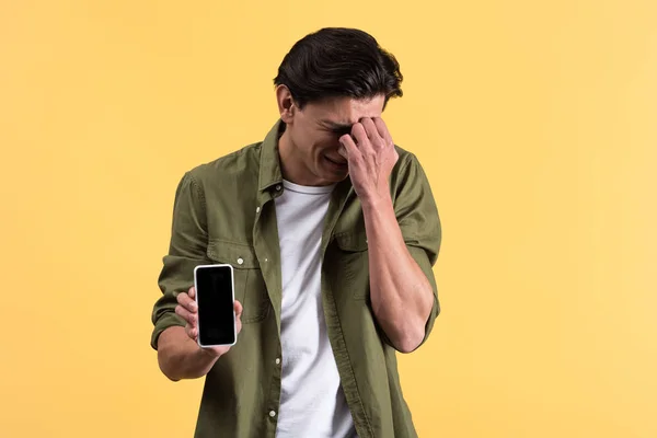 Sad Crying Young Man Showing Smartphone Blank Screen Isolated Yellow — 스톡 사진