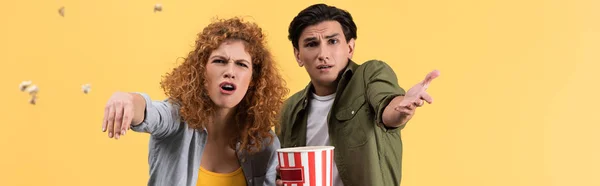 Panoramic Shot Emotional Irritated Couple Watching Bad Movie Throwing Popcorn — Stock Photo, Image