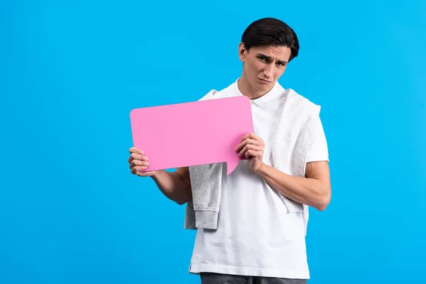 Upset Man Holding Pink Speech Bubble Isolated Blue — Stockfoto