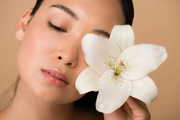 Beautiful Asian Girl Holding White Lily Face Isolated Beige — Stock Photo, Image