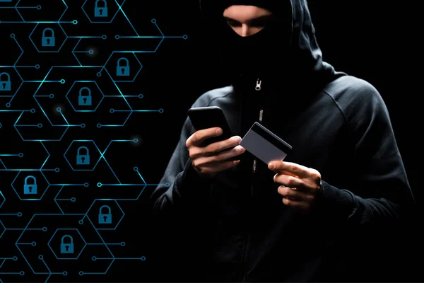 Hacker Hood Using Smartphone Holding Credit Card Padlocks Black — Stock Photo, Image