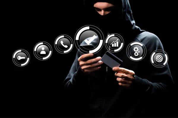 Hacker Hood Using Smartphone Holding Credit Card Web Icons Black — Stock Photo, Image