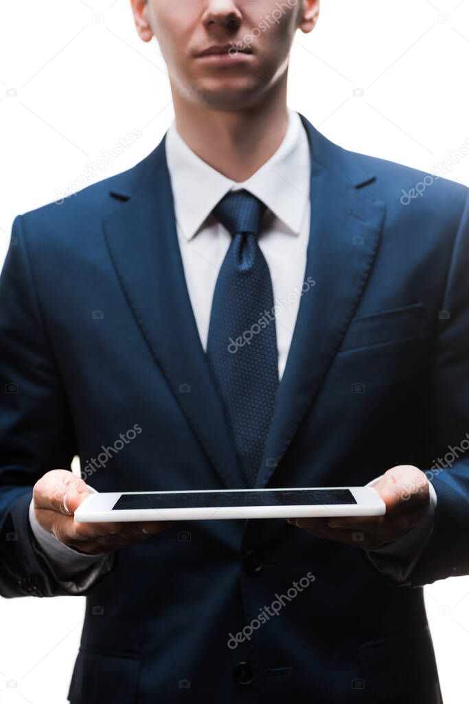 cropped view of businessman holding digital tablet isolated on white 