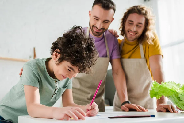 Selective Focus Mixed Race Kid Drawing Picture Happy Homosexual Parents — Stock Photo, Image