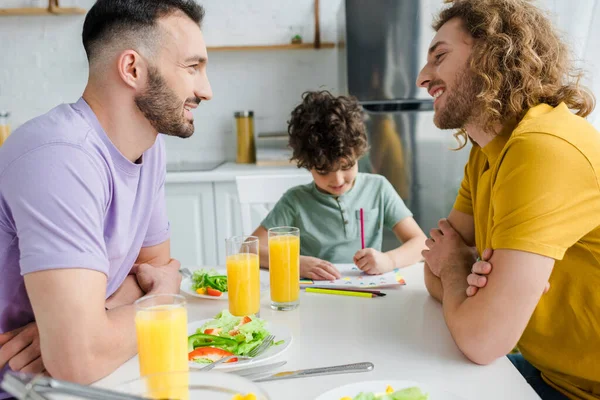 Selective Focus Happy Homosexual Parents Looking Each Other Mixed Race — Stock Photo, Image
