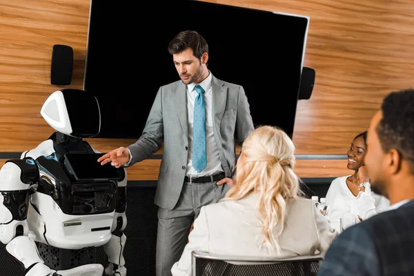 Handsome Businessman Pointing Hand Robot Multicultural Colleagues — Stock Photo, Image