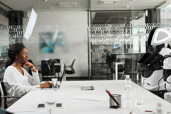 Smiling African American Businesswoman Robot Sitting Desk Conference Hall — Stock Photo, Image