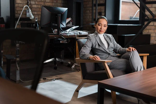 Selective Focus Attractive Asian Businesswoman Sitting Armchair Modern Office — Stock Photo, Image