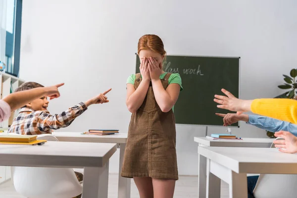 Cruel Schoolboy Pointing Finger Frustrated Classmate Schoolkids Classroom Bullying Concept — Stock Photo, Image