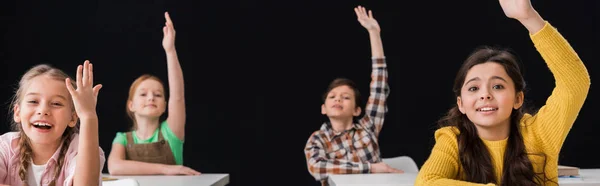 Panoramische Aufnahme Von Schulkindern Mit Erhobenen Händen Isoliert Auf Schwarz — Stockfoto
