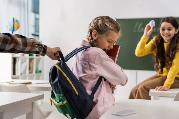 Selective Focus Schoolboy Touching Backpack Scared Bullied Schoolgirl Notebooks Cruel — Stock Photo, Image