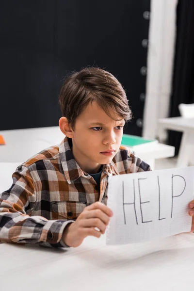 Selective Focus Depressed Schoolboy Holding Paper Help Lettering Bullying Concept — Stock Photo, Image