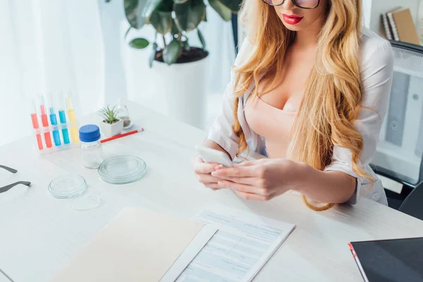 Cropped View Sexy Nurse Big Breast Using Smartphone Clinic — Stock Photo, Image