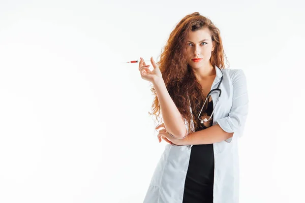 Curly Sexy Nurse Holding Syringe While Looking Camera Isolated White — Stock Photo, Image
