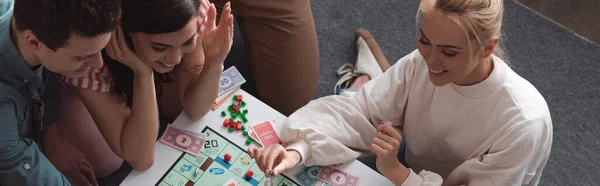 Kyiv Ukraine January 2020 Overhead View Cheerful Friends Playing Monopoly — Stock Photo, Image