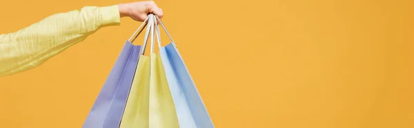 Panoramic Shot Young Woman Holding Shopping Bags Isolated Yellow — Stock Photo, Image