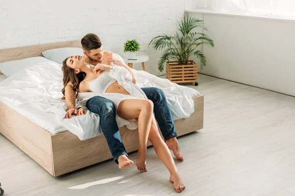 Sexy Man Jeans Embracing Seductive Girlfriend White Shirt Bralette While — Stock Photo, Image