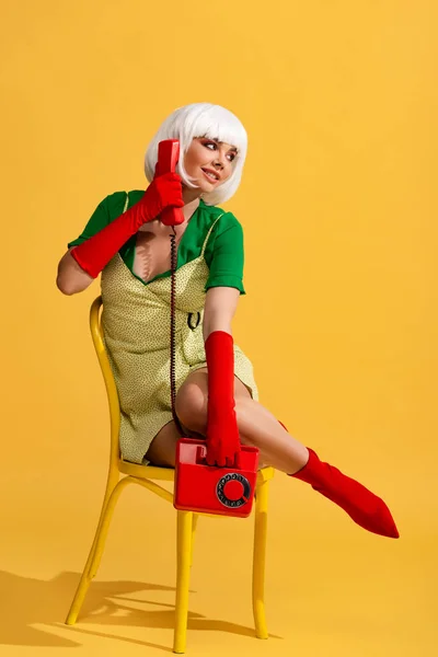 Smiling Girl White Wig Talking Retro Phone While Sitting Chair — Stock Photo, Image