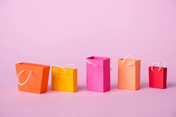 Bolsas Compras Coloridas Pequeñas Rosa Con Espacio Copia —  Fotos de Stock