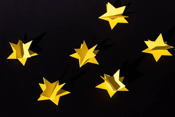 Decorative Yellow Paper Stars Isolated Black — Stock Photo, Image