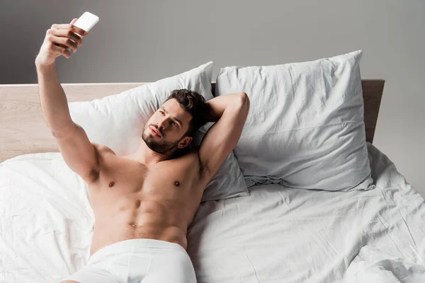 Handsome Shirtless Sexy Man Taking Selfie Smartphone Bed Grey — Stock Photo, Image