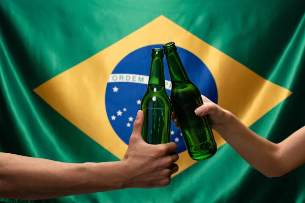 Cropped View Couple Football Fans Clinking Bottles Beer Brazil Flag — Stock Photo, Image