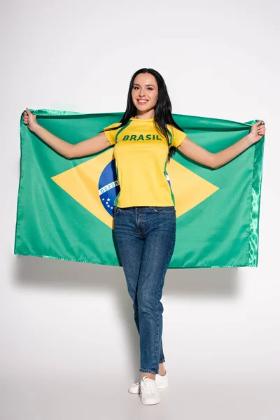 Attractive Happy Female Football Fan Holding Brazilian Flag Grey — Stock Photo, Image