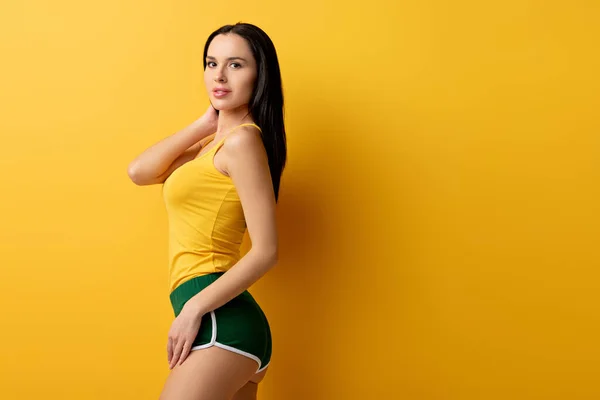 Attractive Girl Standing Green Shorts Yellow — Stock Photo, Image