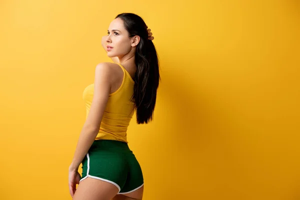 Attractive Girl Standing Green Shorts Yellow — Stock Photo, Image