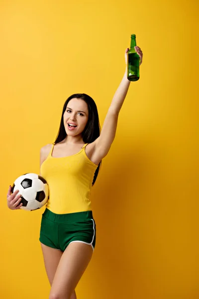 Excited Female Football Fan Holding Ball Bottle Beer Yellow — Stock Photo, Image