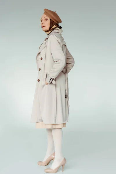 Side View Stylish Senior Woman Trench Coat Looking Camera White — Stock Photo, Image