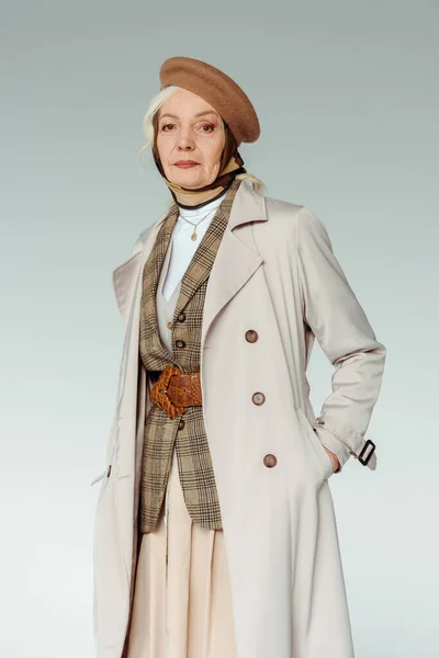 Fashionable Senior Woman Beret Trench Coat Looking Camera Isolated Grey — Stock Photo, Image