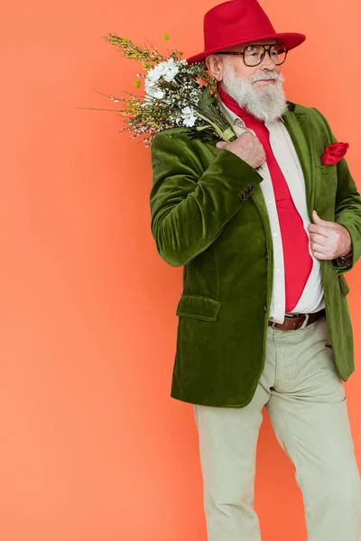 Stylish Senior Man Posing Bouquet Wildflowers Isolated Coral — Stock Photo, Image