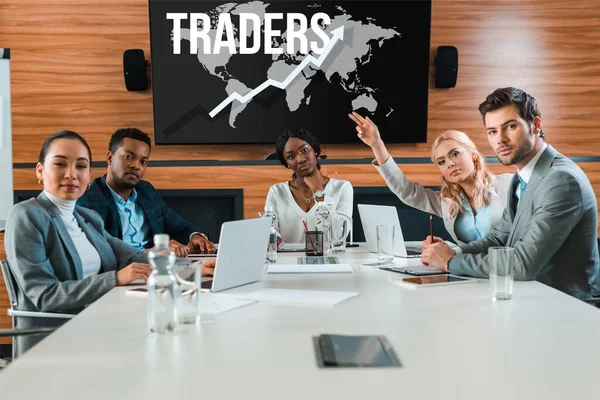 Young Businesswoman Raising Hand While Sitting Conference Hall Multicultural Colleagues — Stock Photo, Image