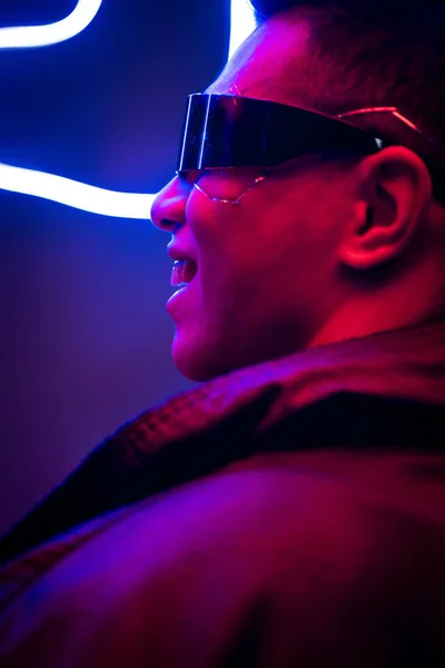 Happy Mixed Race Cyberpunk Player Futuristic Glasses Smiling Neon Lighting — Stock Photo, Image