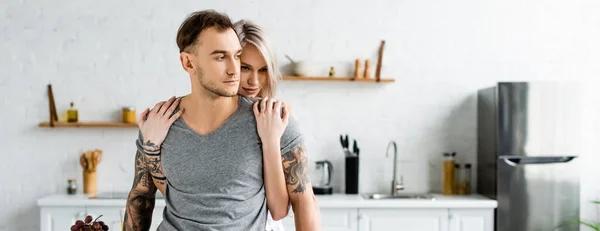 Panoramic Shot Attractive Girl Embracing Tattooed Boyfriend Kitchen — Stock Photo, Image