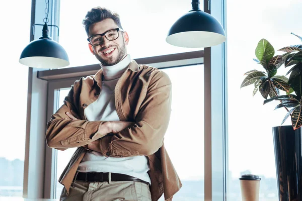 Low Angle View Worker Crossed Arms Smiling Looking Camera Paper — Stock Photo, Image