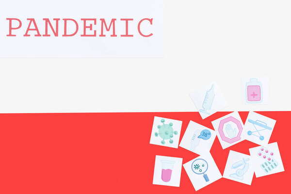 вид сверху пандемических надписей рядом с медицинскими рисунками на польском флаге
