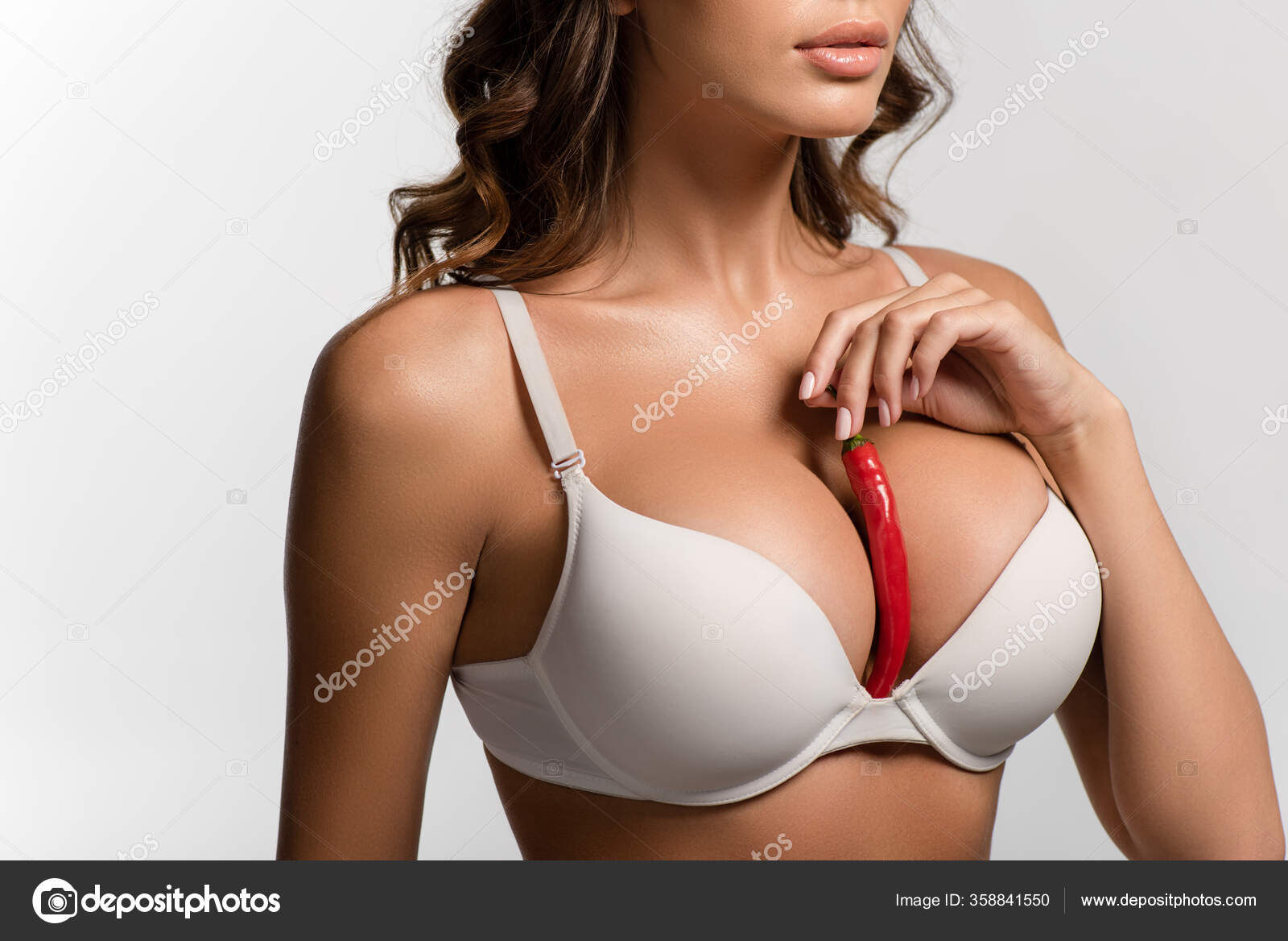 Partial View Girl Holding Red Hot Chili Pepper Big Breasts Stock Photo by  ©VitalikRadko 358841550