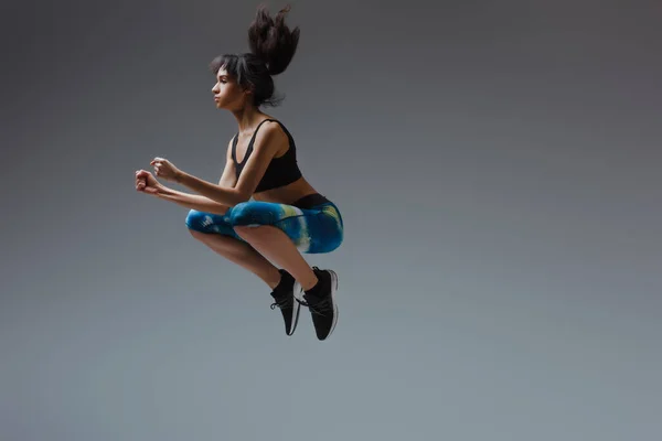 Sportive African American Girl Sportswear Jumping Grey — Stock Photo, Image