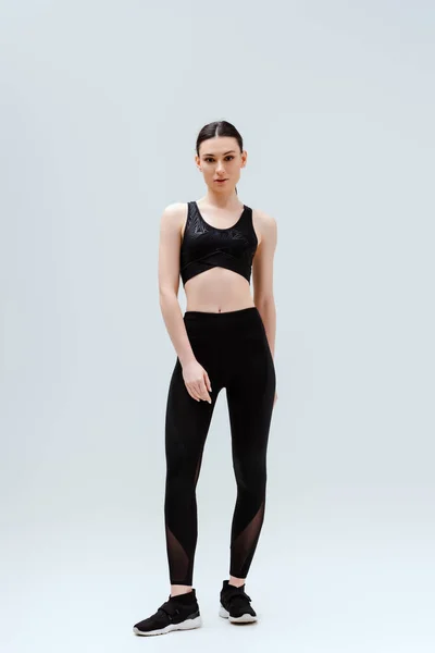 Sportive Woman Black Sportswear Standing Isolated White — Stock Photo, Image
