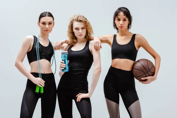 Attractive Multicultural Girls Standing Sport Equipment Isolated White — Stock Photo, Image