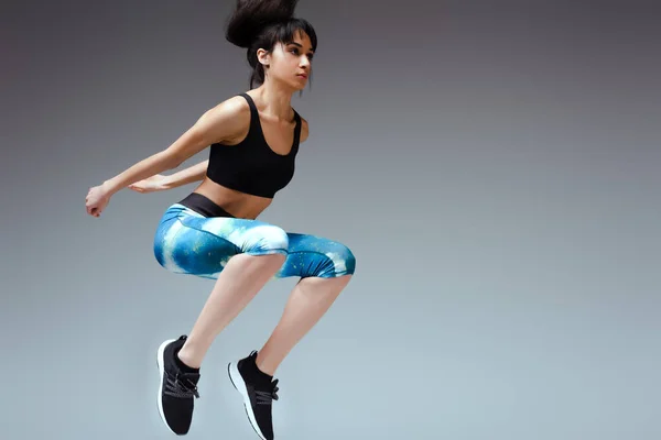 Pretty African American Girl Sportswear Jumping Grey — Stock Photo, Image