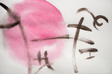 Beyaz zemin üzerinde hiyeroglifler ve pembe daireler olan Japon resimleri.