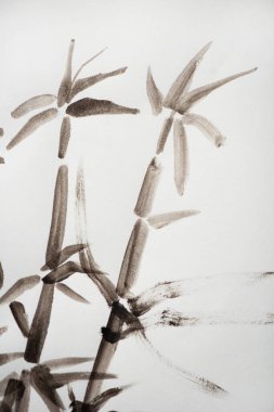 Beyaz zemin üzerinde bambu olan Japon tablosu